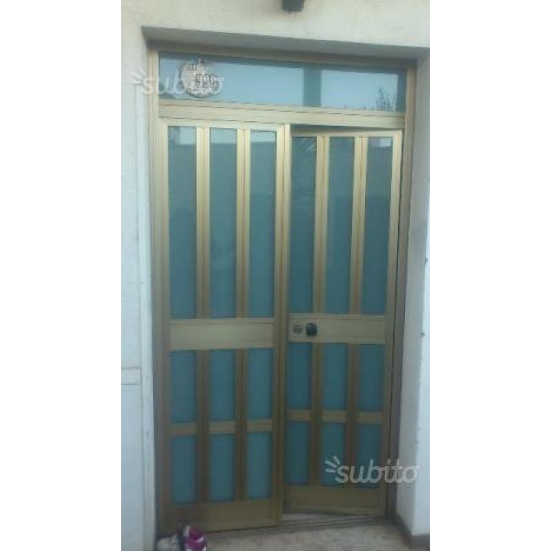 Porta doppia anta in allumunio