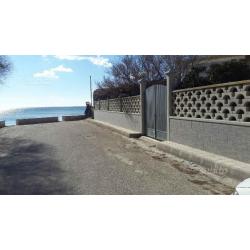 Ampio monolocale nel verde sul mare a Torre Lapill