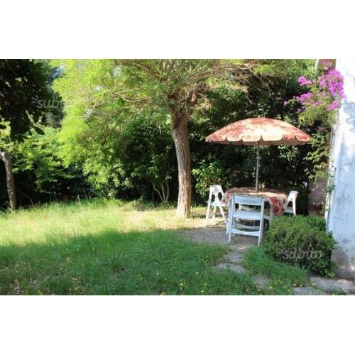 Bilocale con giardino privato e posto auto