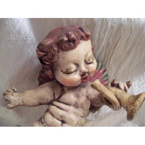 Thun antico putto con tromba capelli rossi