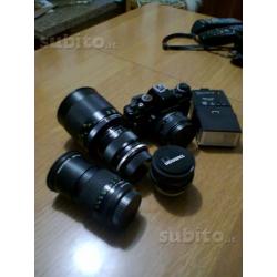 Vecchia macchina fotografica + teleobiettivo