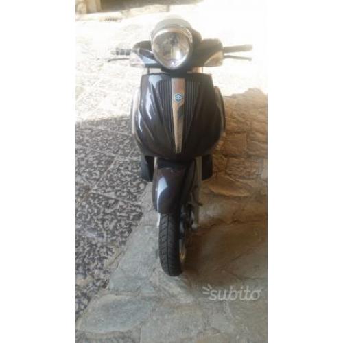 Beverly 124 tourer